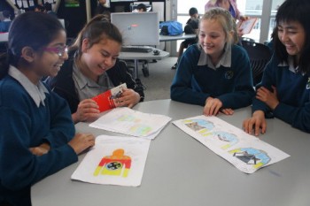 Students with drawings.